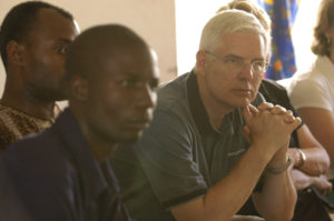 In 2004, Rich Stearns, with wife, Renee, and daughter, Sarah, met with Senzani area pastors in Malawi to hear about their response to HIV/AIDS in the community, and to learn their concerns. (Photo: Jon Warren, 2004)