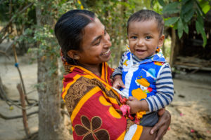 Mother and child who benefited from foreign assistance