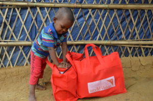 Boy receiving food aid
